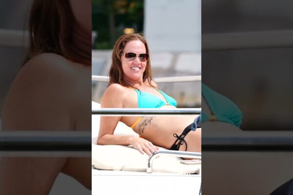 Bow Bliss: Chillin', Smilin', and Wavin' on the Yacht!  😎👋🚤 #YachtLifeSmiles #BowWaves