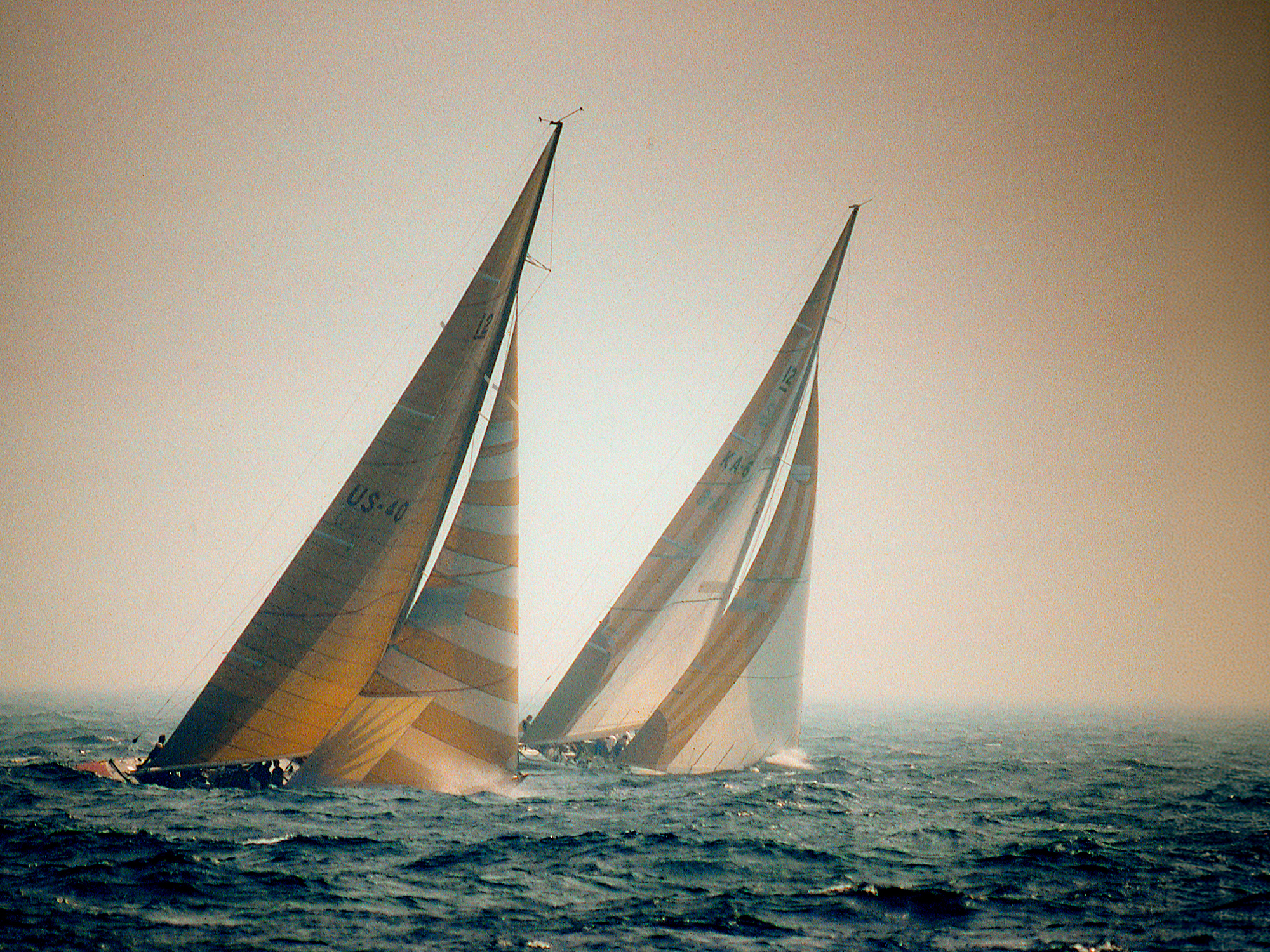 AUSTRALIA II leads LIBERTY up the last windward leg in the sixth race of the 1983 America