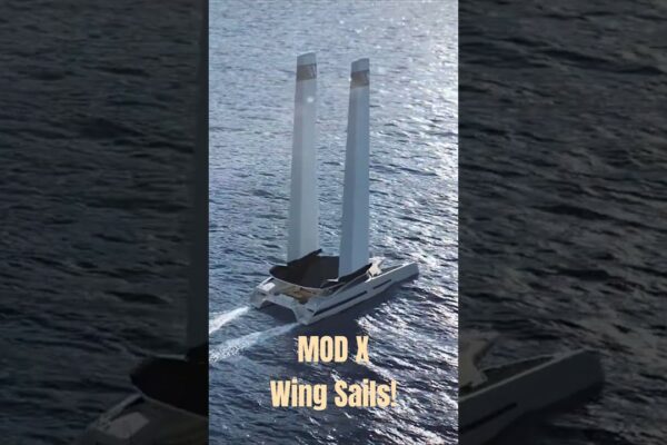 Mod X Catamaran cu pânze de aripi umflate. Superyacht de navigare eco de lux.